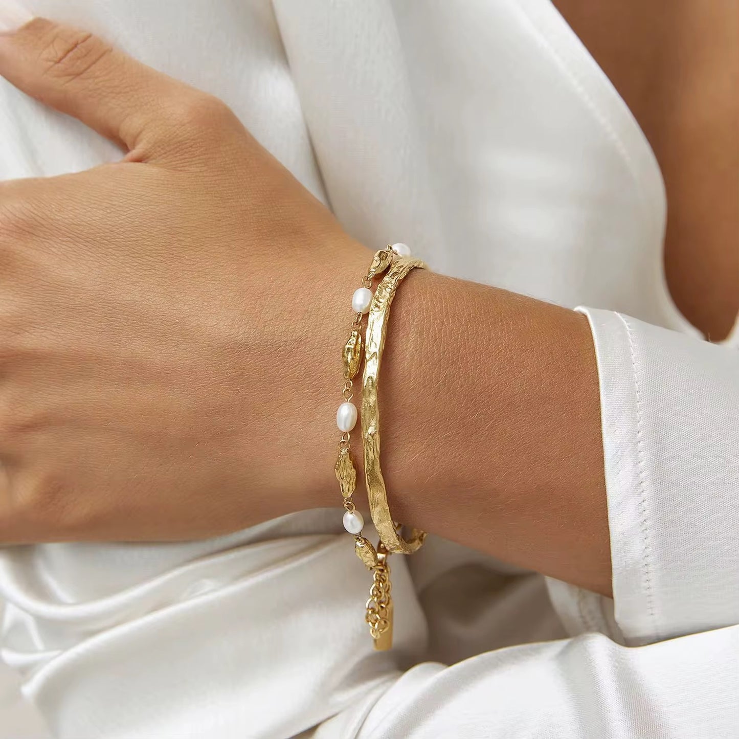 Minimalist gold cuff bangle styling