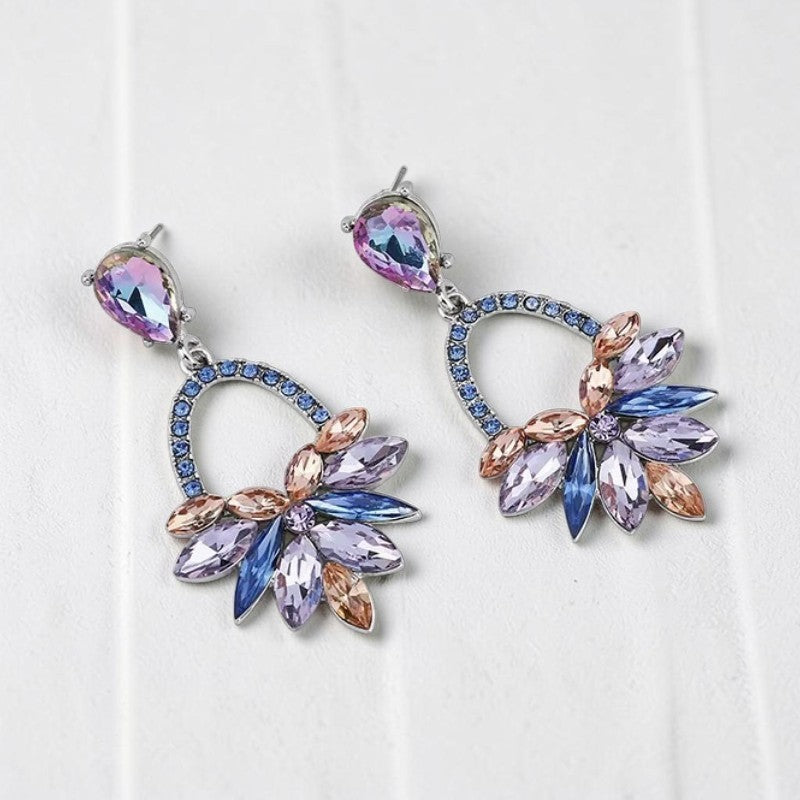 Calilo Australia Adele statement drop earrings featuring multi-faceted lilac, blue, and champagne crystals in silver.