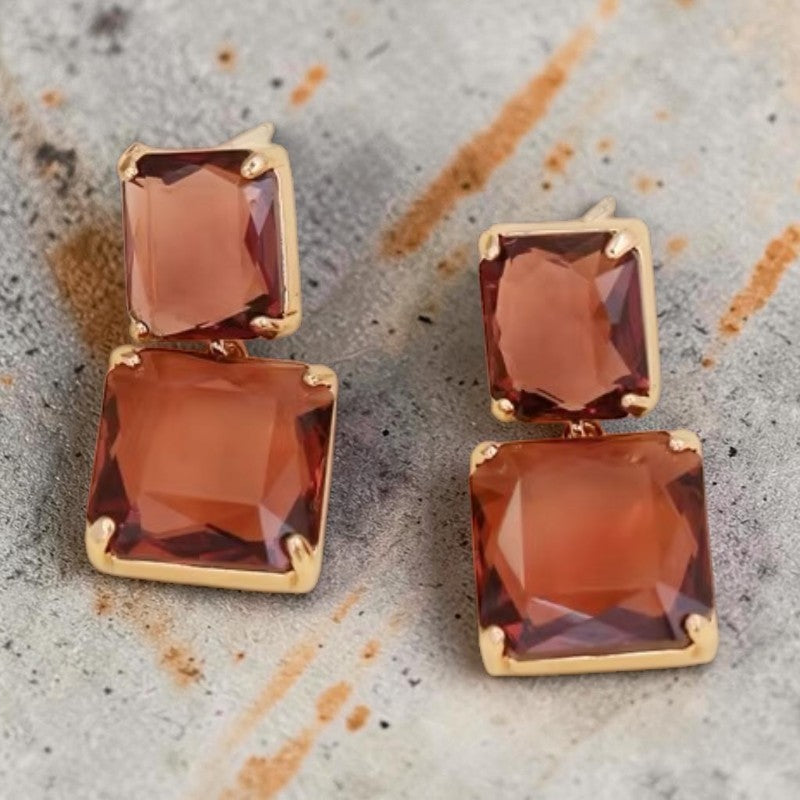Calilo Australia double-drop earrings with faceted amber rectangular stones in polished gold-tone settings.