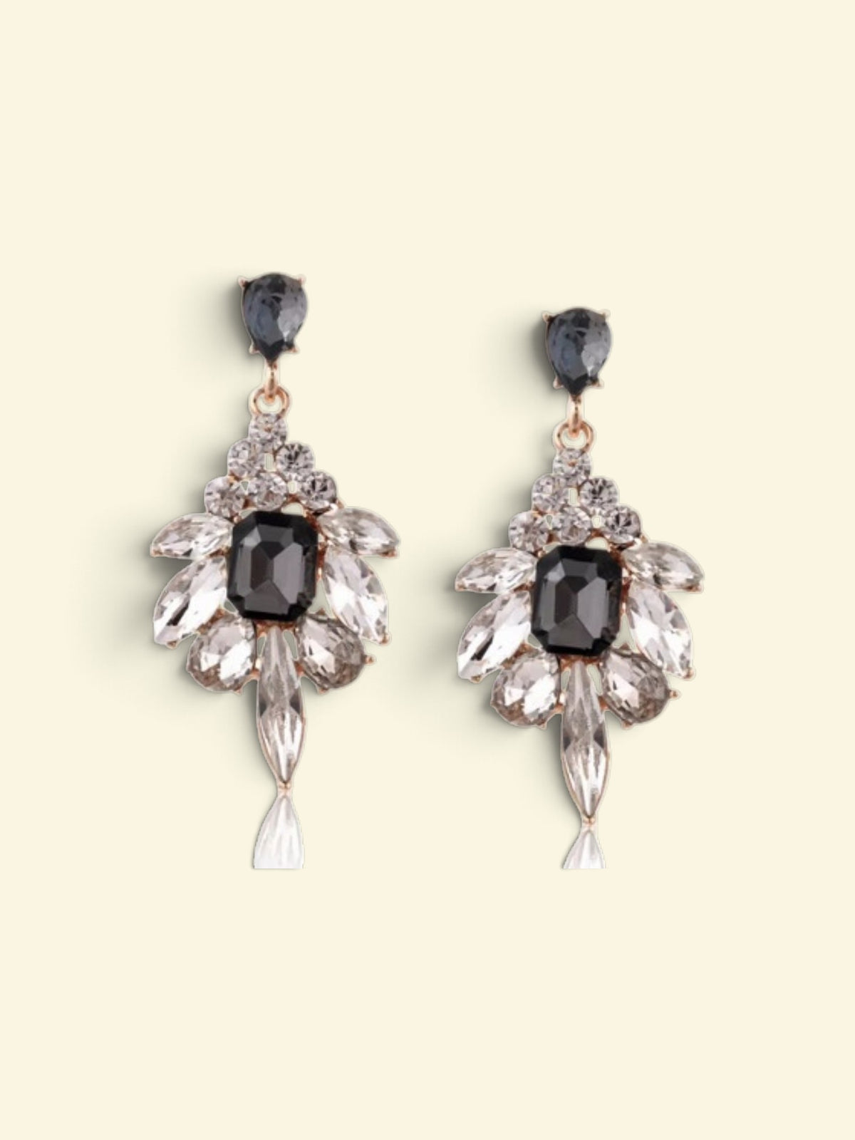 Calilo Australia crystal chandelier drop earrings featuring charcoal-grey and clear stones in a floral silhouette.