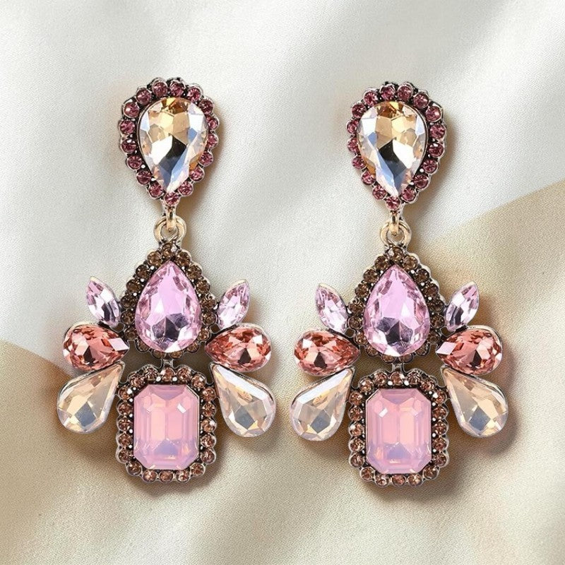 Calilo Australia statement drop earrings with blush, champagne, and rose crystals in an antique metal setting.