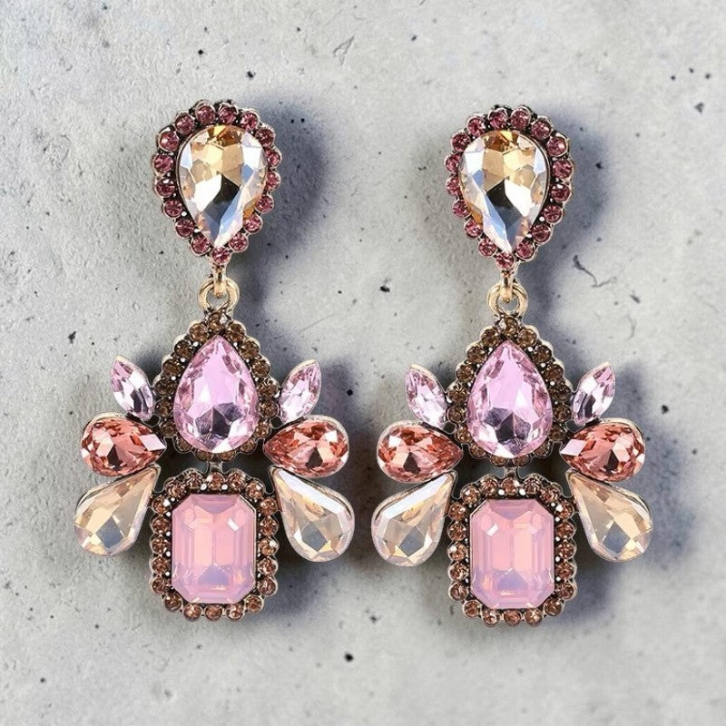 Calilo Australia statement drop earrings featuring multi-faceted blush, champagne, and rose crystals in antique metal.