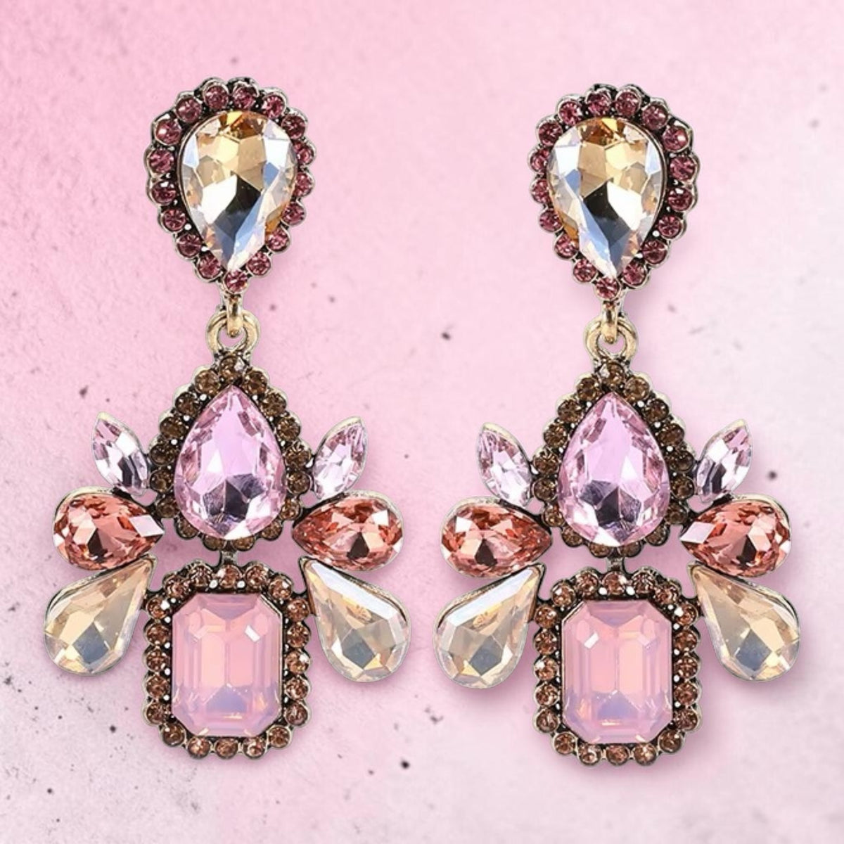 Calilo Australia statement drop earrings with blush, champagne, and rose crystals in an antique metal setting.