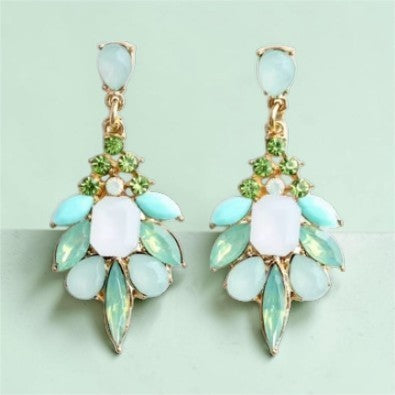 Calilo Australia statement drop earrings with mint, lime green, and white gemstones on a polished gold-tone base.