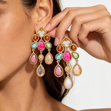 Calilo Australia gold-tone chandelier drop earrings featuring vibrant multi-colored faceted teardrop crystals.