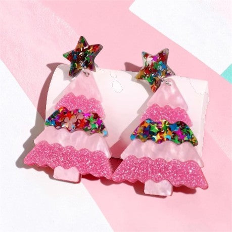Calilo Australia pink acrylic Christmas tree statement earrings with glitter textures and multi-colored star accents.