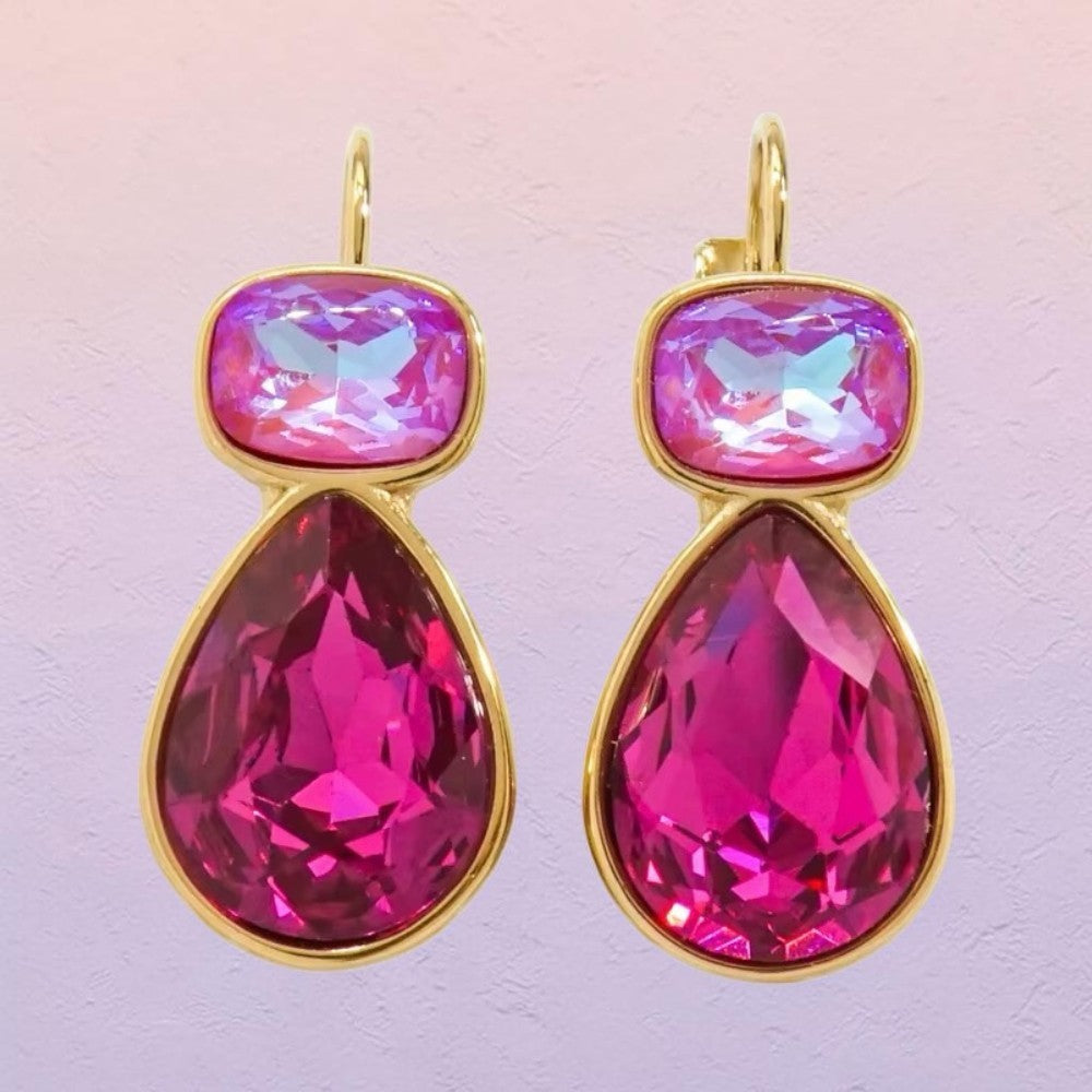 Calilo Australia dual-tone teardrop earrings featuring iridescent pink and fuchsia crystals in a polished gold setting.