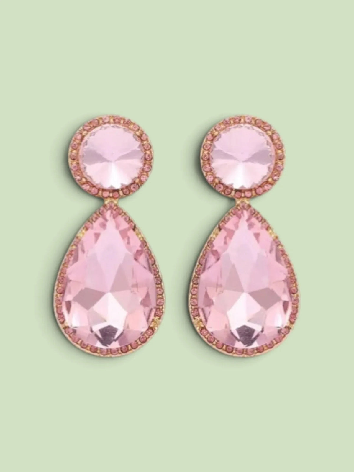 Calilo Australia blush pink crystal teardrop statement earrings with gold-toned settings and pavé halo accents.