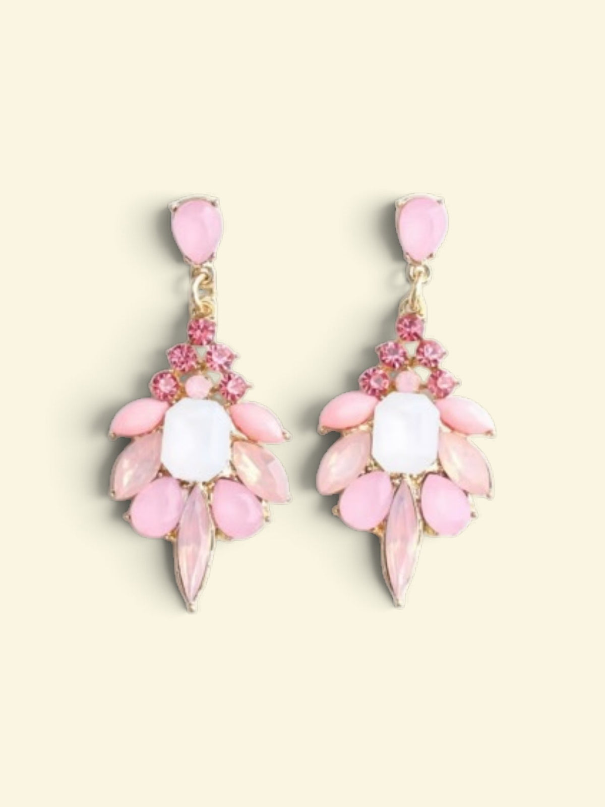 Calilo Australia statement drop earrings featuring pink and white stones in a gold-tone chandelier setting.
