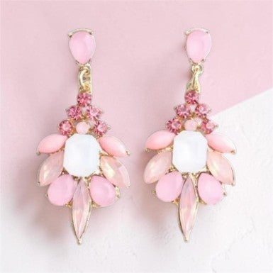 Calilo Australia statement drop earrings featuring pink and white stones in a gold-tone chandelier setting.
