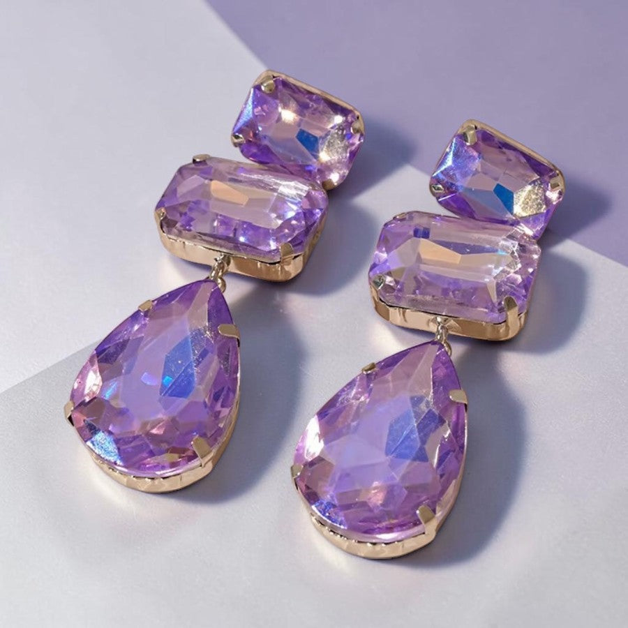 Calilo Australia elegant drop earrings featuring iridescent purple crystals in geometric shapes set in gold-tone metal.