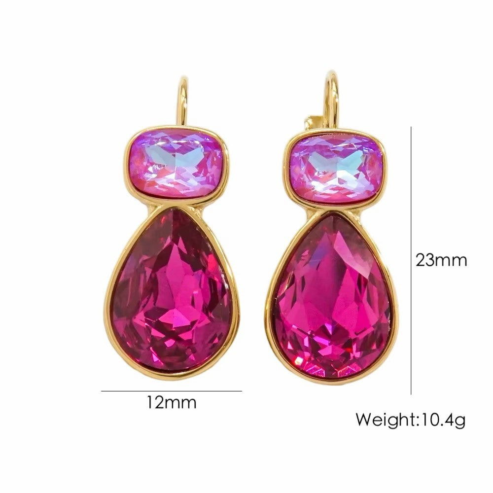 Calilo Australia dual-tone teardrop crystal earrings in iridescent pink and fuchsia with a polished gold-tone frame.
